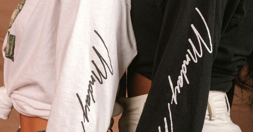 Women wearing black and white shirts